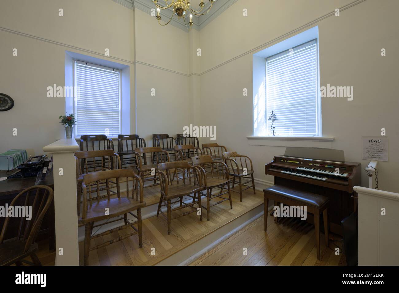 Jury box chairs inside the historic Pioneer Courthouse on St George Blvd in St. George, Utah Stock Photo
