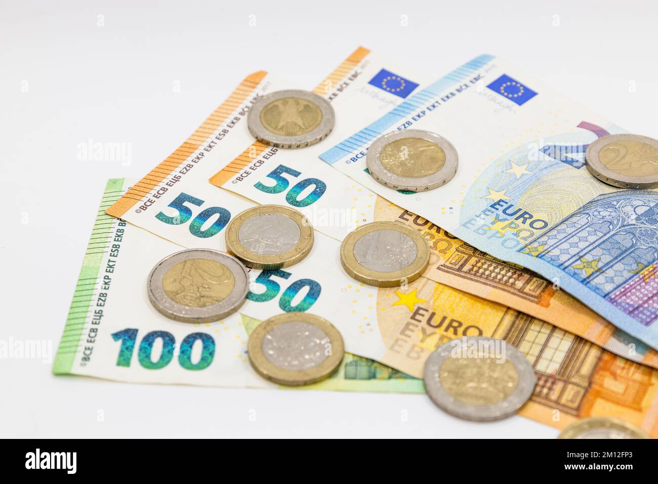 Euro banknotes and coins. Financial accounting and saving money concepts Stock Photo