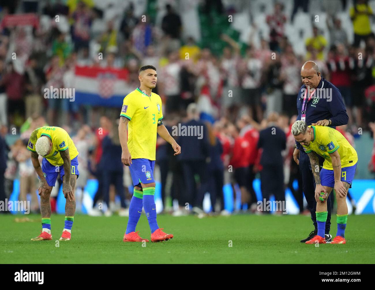 Brazil's Neymar, Thiago Silva and Antony react to defeat in a penalty shoot-out following the FIFA World Cup Quarter-Final match at the Education City Stadium in Al Rayyan, Qatar. Picture date: Friday December 9, 2022. Stock Photo