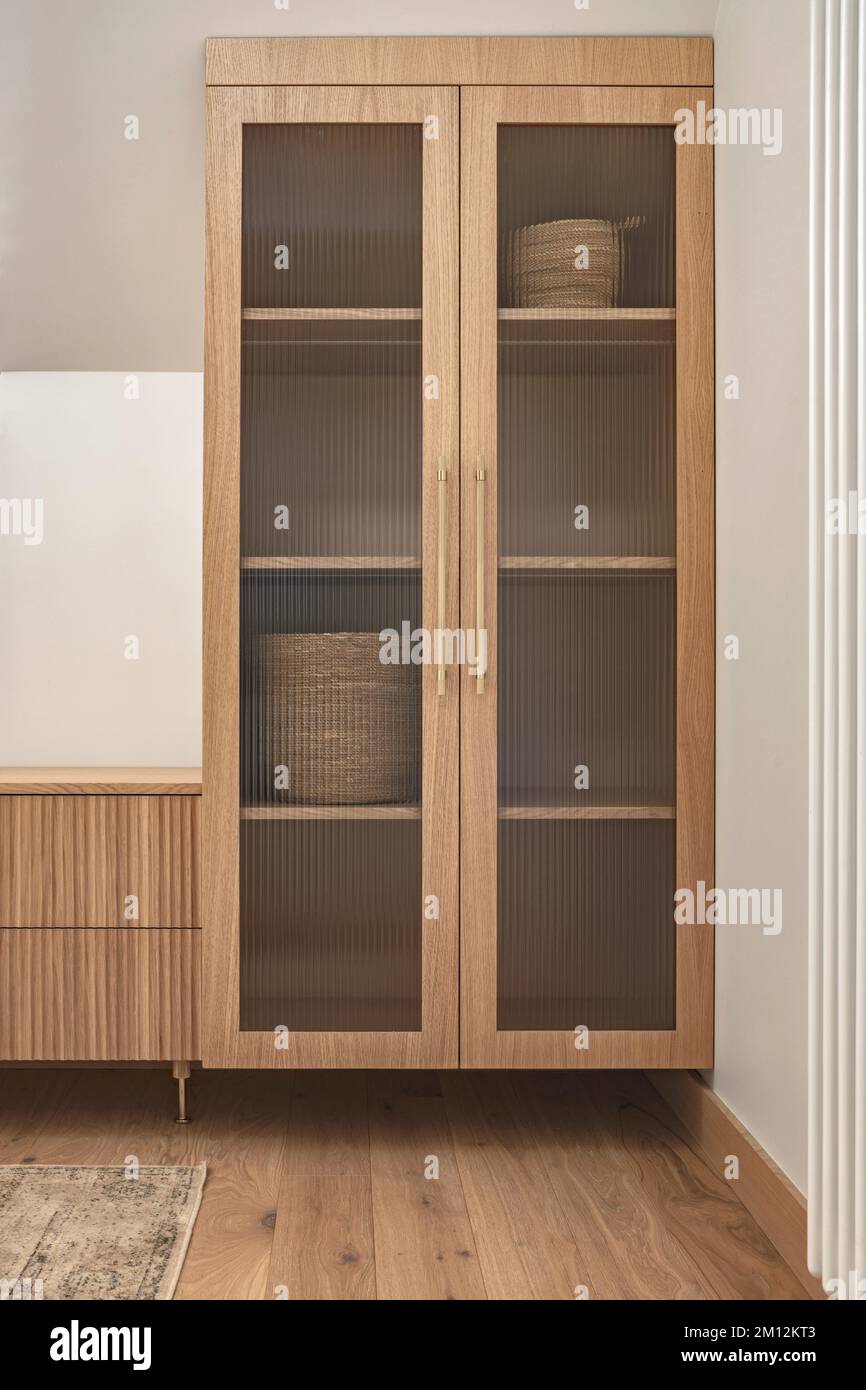 Japandi light and warm interior design with oak furniture. Japandi design concept Stock Photo