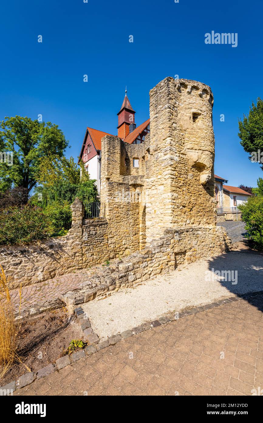 Uffhub gate with old electric power station in Ingelheim am Rhein, part of the southwestern city fortifications from the 14th century, shell tower with archway and battlements Stock Photo