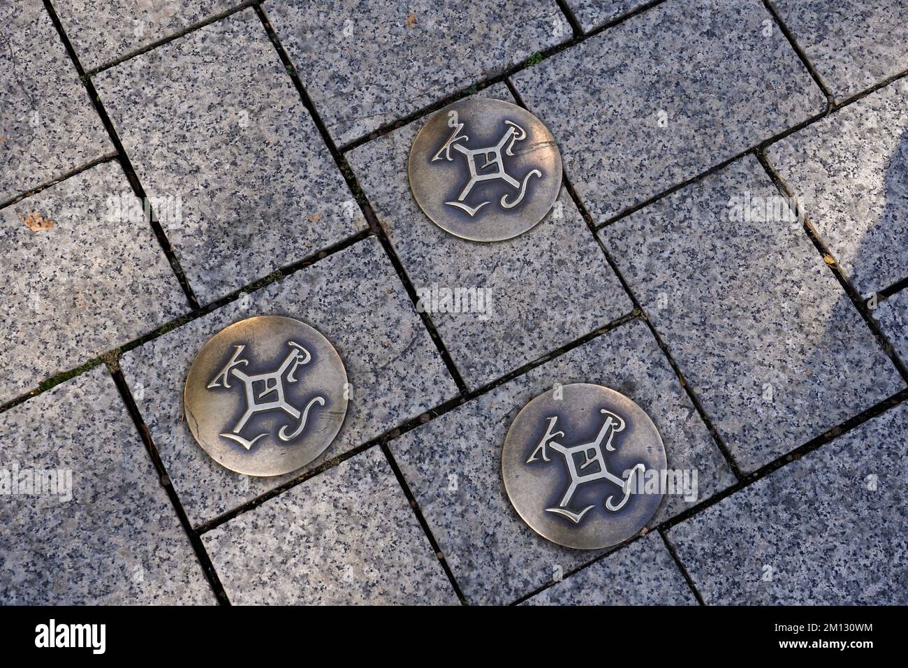 Germany, North Rhine-Westphalia, Aachen, pedestrian zone, pavement, floor marking, bronze plate, Charlemagne seal, KRLS, monogram, Charlemagne Stock Photo