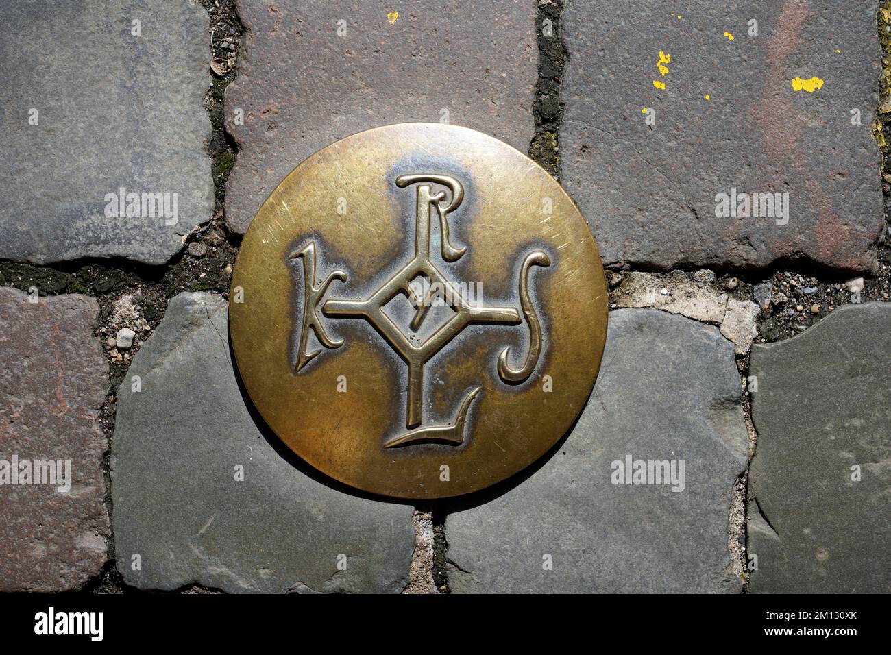 Germany, North Rhine-Westphalia, Aachen, pedestrian zone, cobblestone, floor marking, bronze plate, Charlemagne seal, KRLS, monogram, Charlemagne Stock Photo