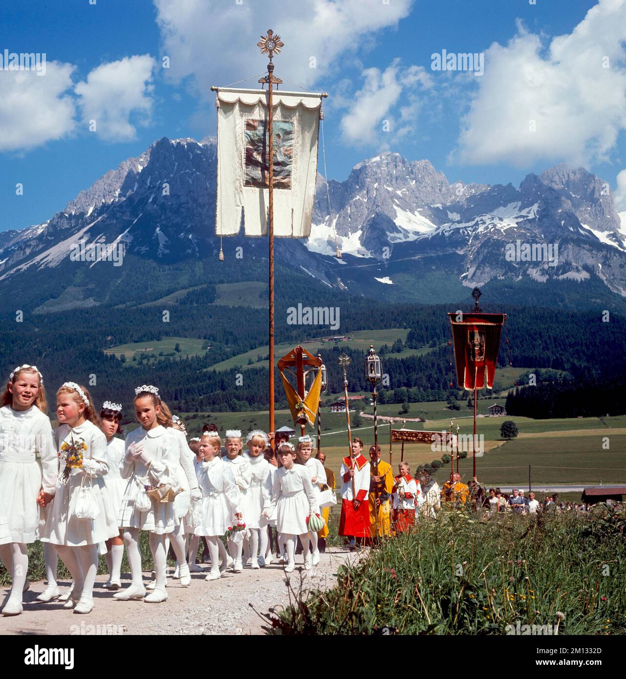 Corpus Christi procession in front of the Wilder Kaiser, Ellmau, Tyrol ...