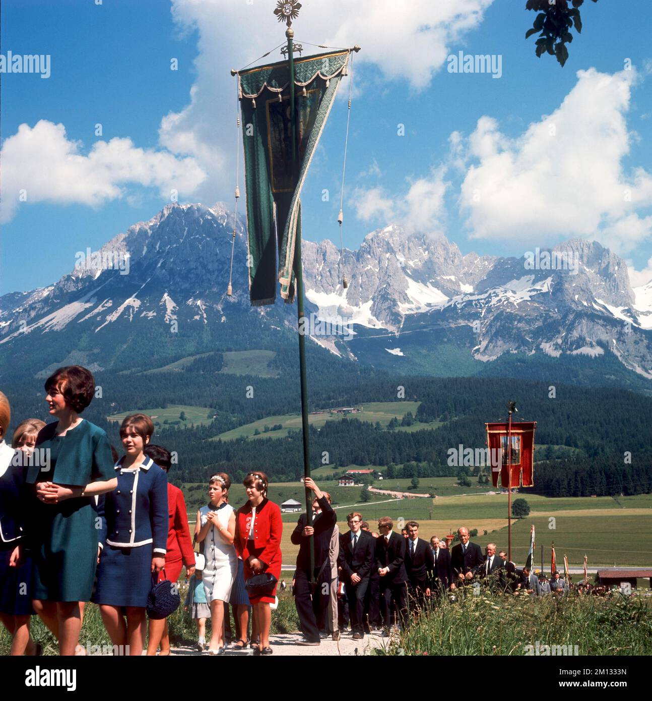 Corpus Christi procession in front of the Wilder Kaiser, Ellmau, Tyrol ...
