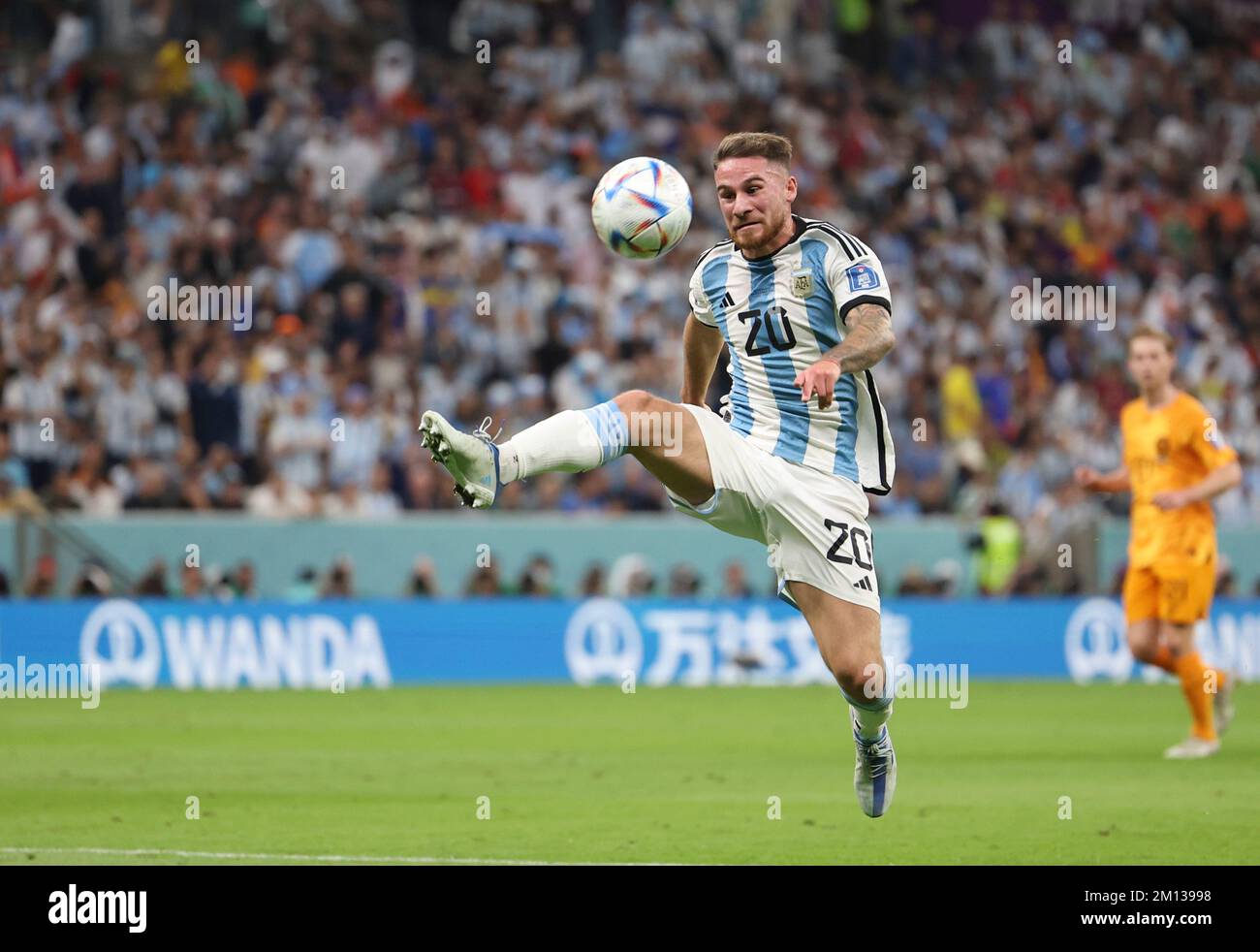 Lusail Iconic Stadium, Lusail, Qatar. 18th Dec, 2022. FIFA World Cup  Football Final Argentina versus France; Alexis Mac Allister of Argentina  lifts the world cup trophy Credit: Action Plus Sports/Alamy Live News