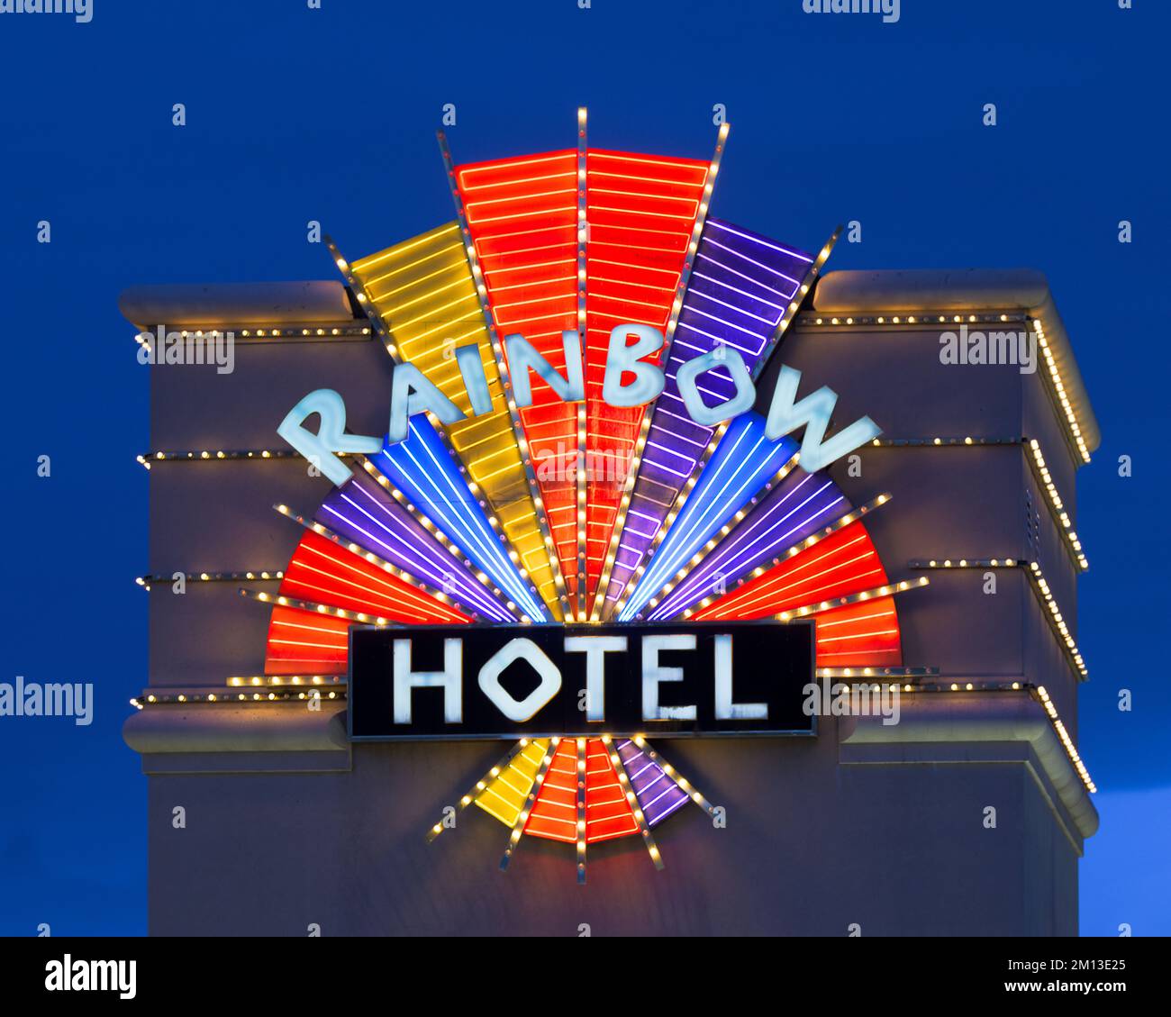 Rainbow Casino, Hotel, & Travel Center neon sign at 1045 Wendover Blvd in West Wendover, Nevada Stock Photo