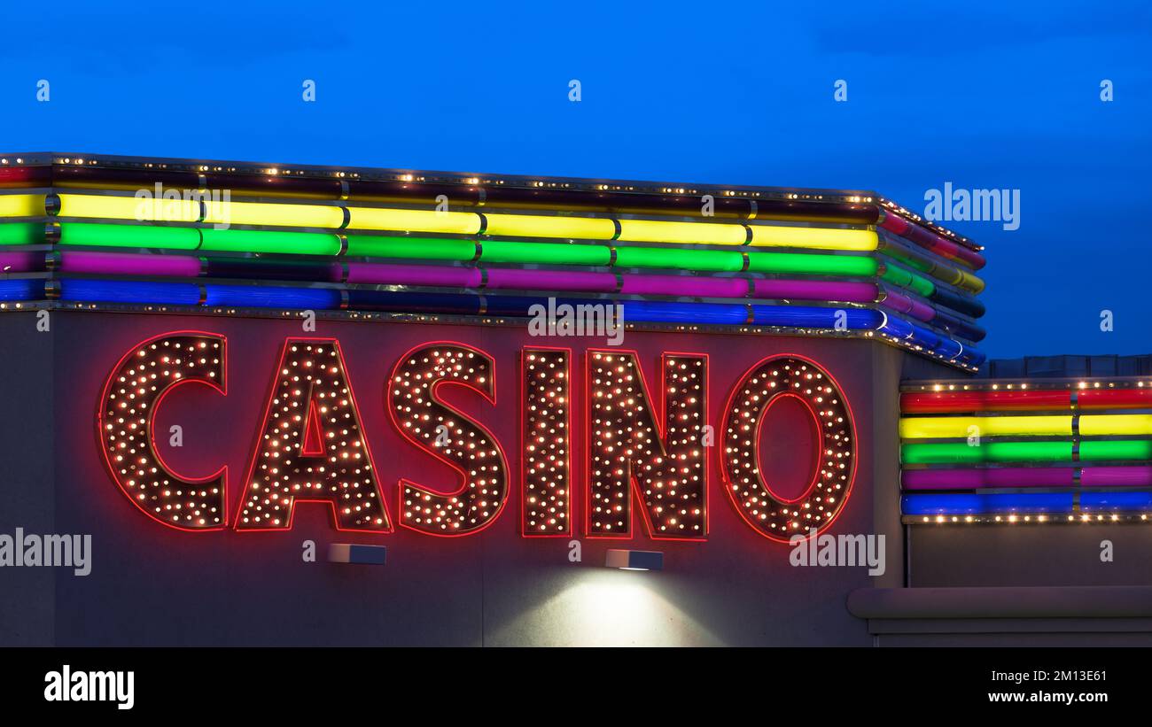 Rainbow Casino, Hotel, & Travel Center neon sign at 1045 Wendover Blvd in West Wendover, Nevada Stock Photo