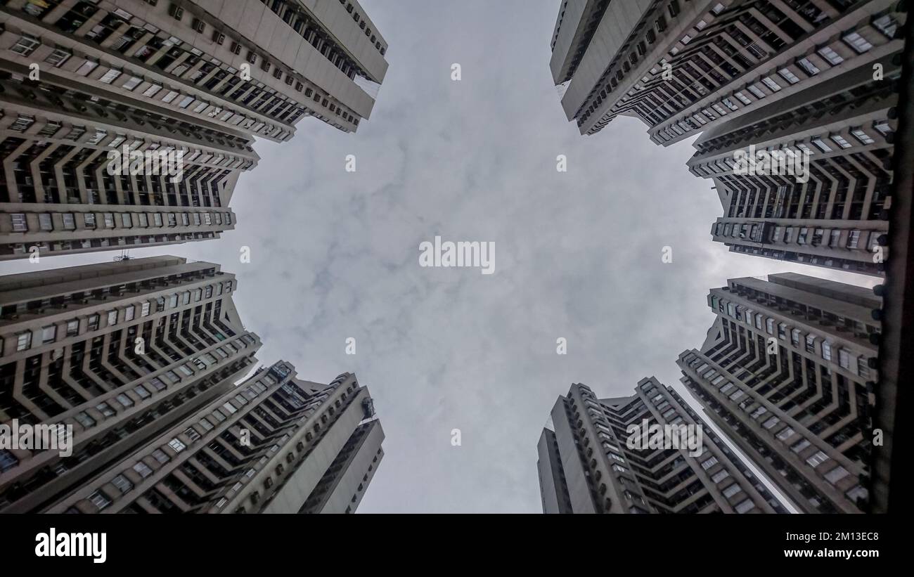 A low angle shot of beautiful residential buildings under a cloudy sky ...