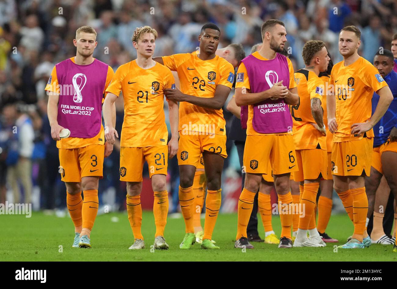 Netherlands Players Stand Dejected After Their Sides Defeat In The