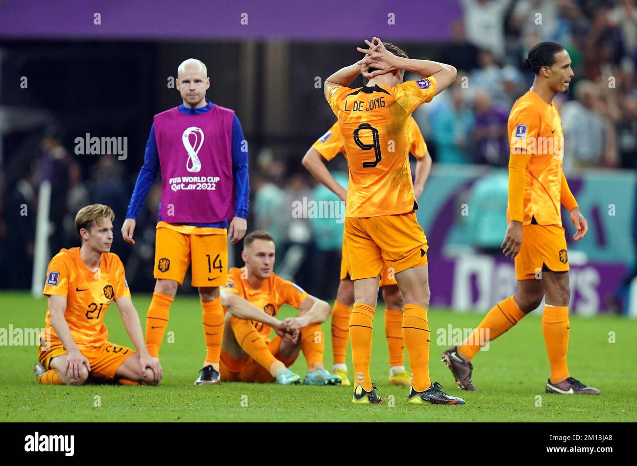 Netherlands Players Stand Dejected After Their Sides Defeat In The