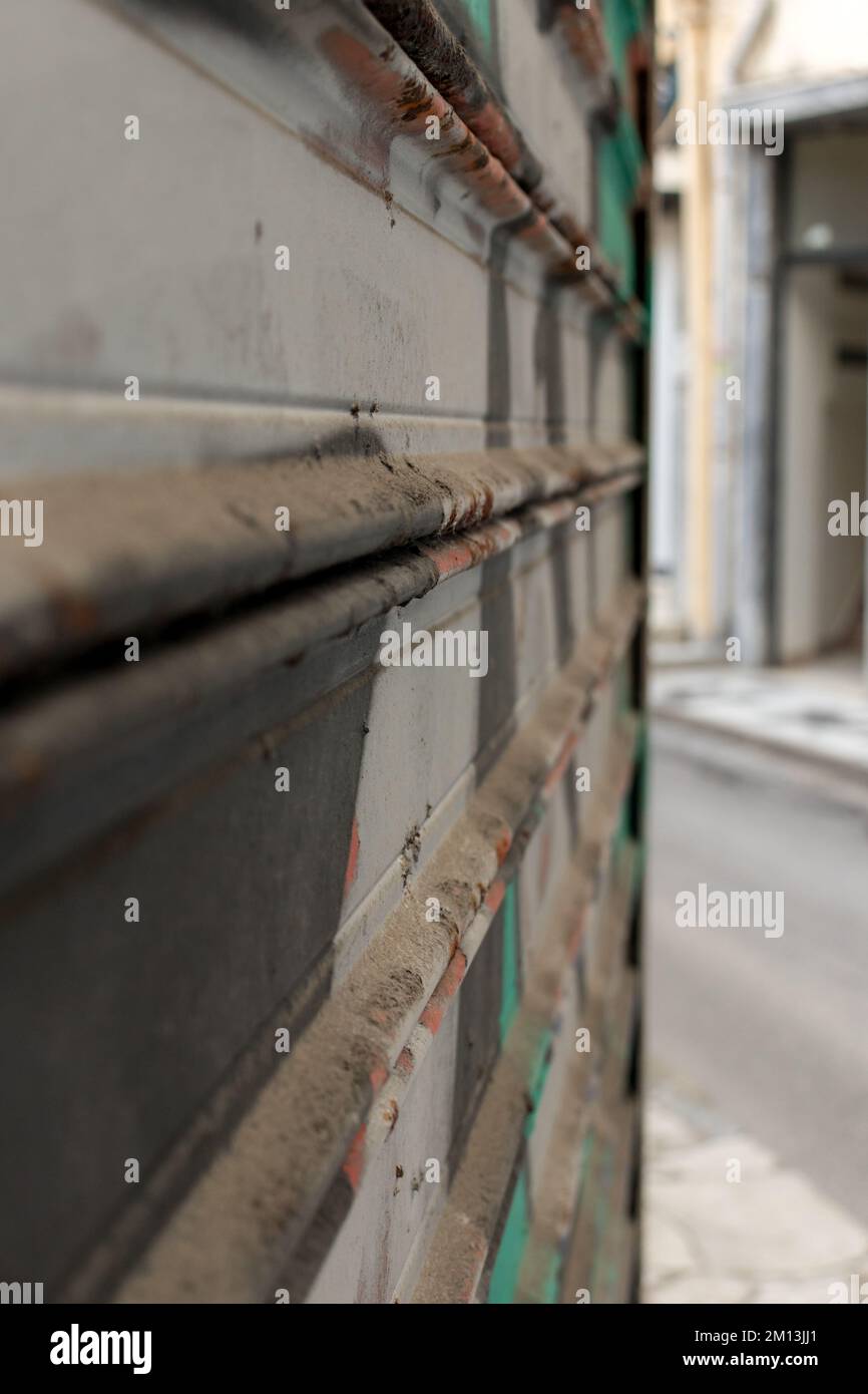 Close up view of closed shop roll with graffiti on it Stock Photo