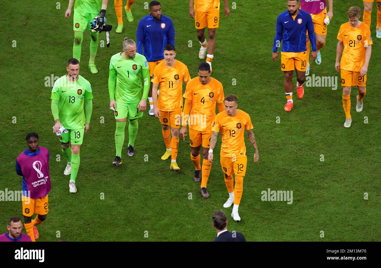 Netherlands Players Stand Dejected After Their Sides Defeat In The