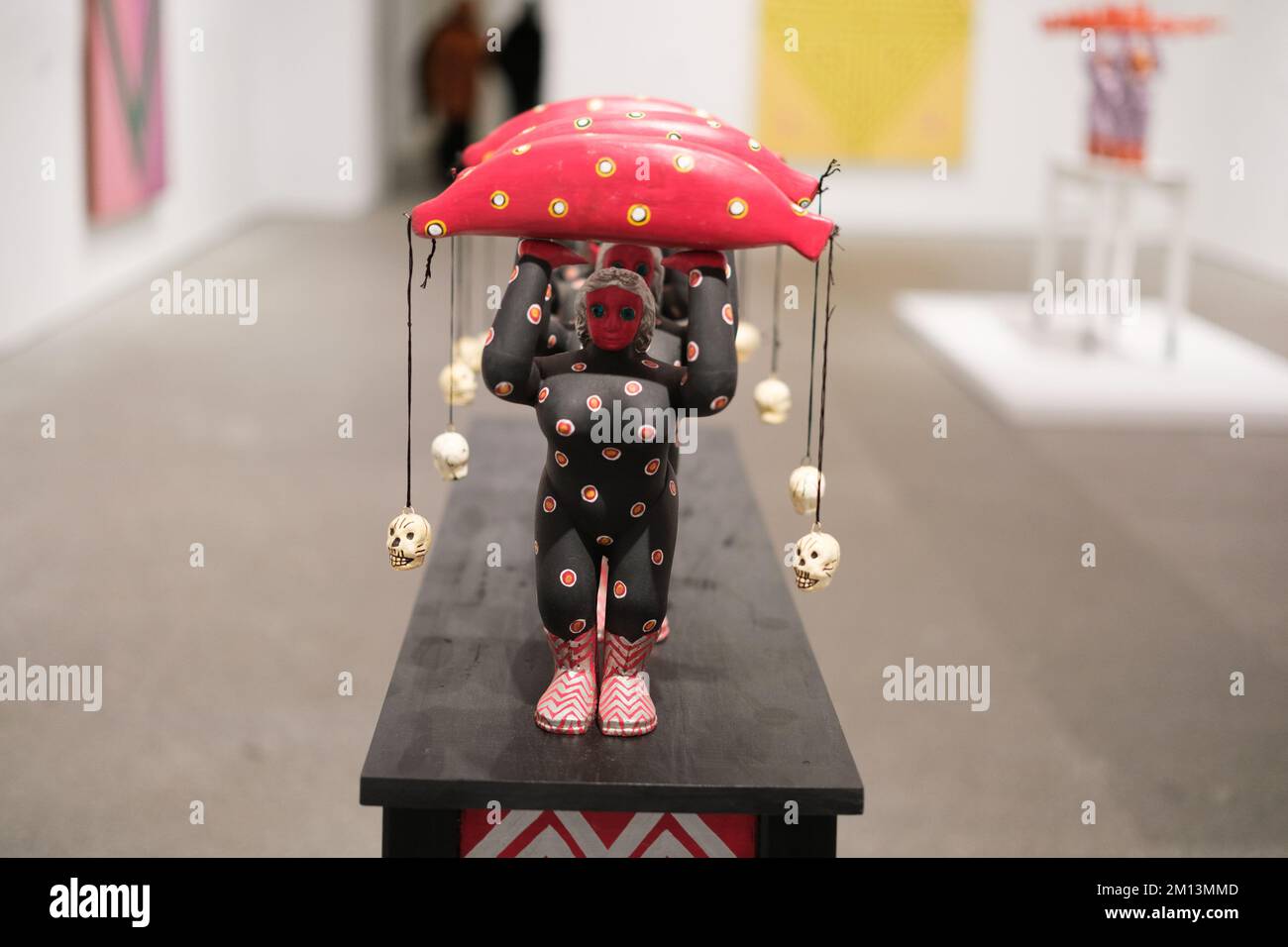 A sculpture titled "The carriers of red bananas" seen during the