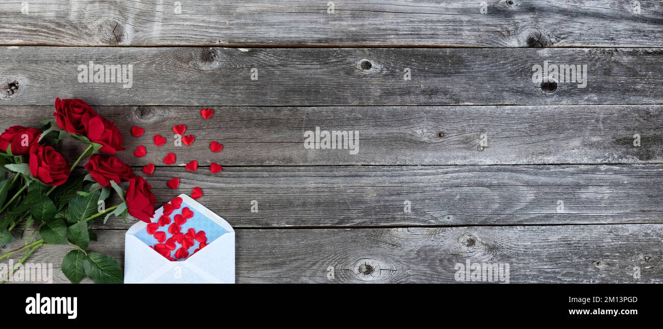 Valentines day greeting concept with envelope, hearts and red rose ...