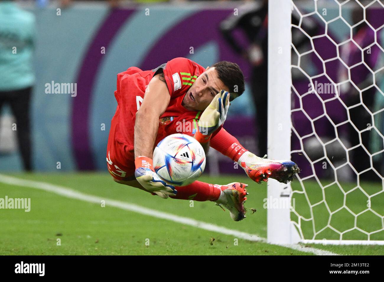 9th December 2022: Lusail Stadium, Lusail, Qatar: FIFA World Cup football, quarter finals, Netherlands versus Argentina: Emiliano Martinez Argentina, saves penalty kick by Steven Berghuis Netherlands Stock Photo