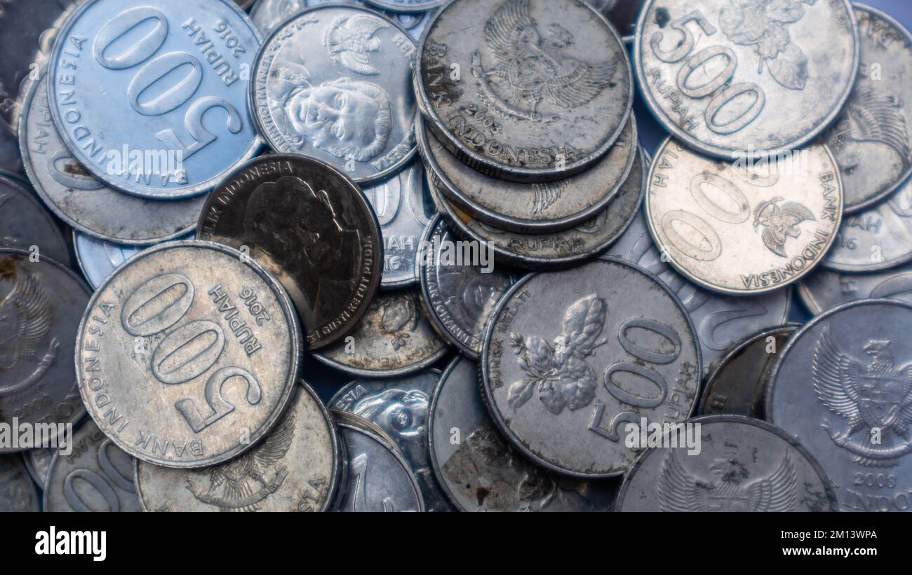 pile of rupiah coins as background Stock Photo - Alamy