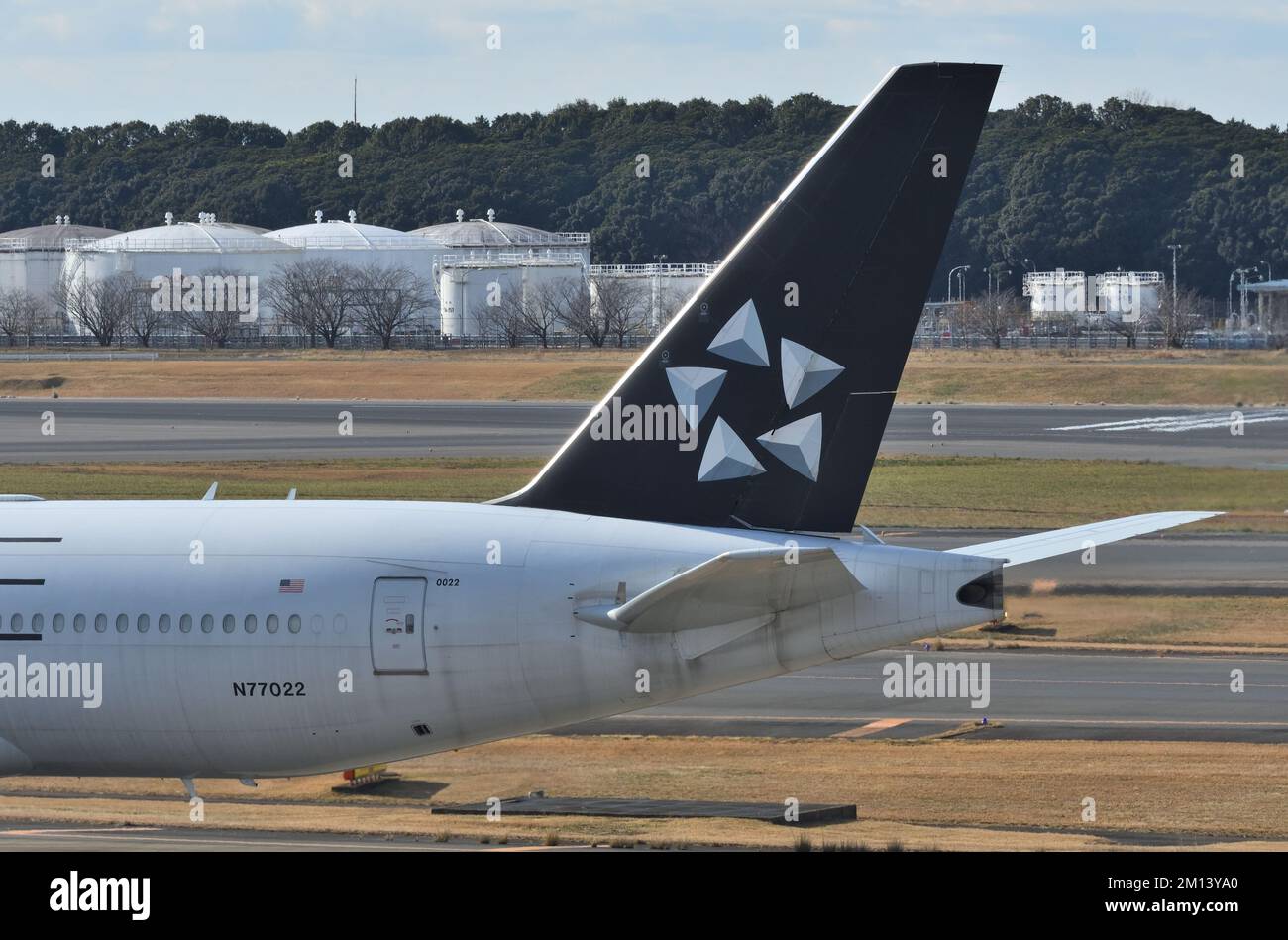 Chiba Prefecture, Japan - December 19, 2020: United Airlines Star Alliance livery Boeing B777-200ER (N77022) Vertical Fin. Stock Photo