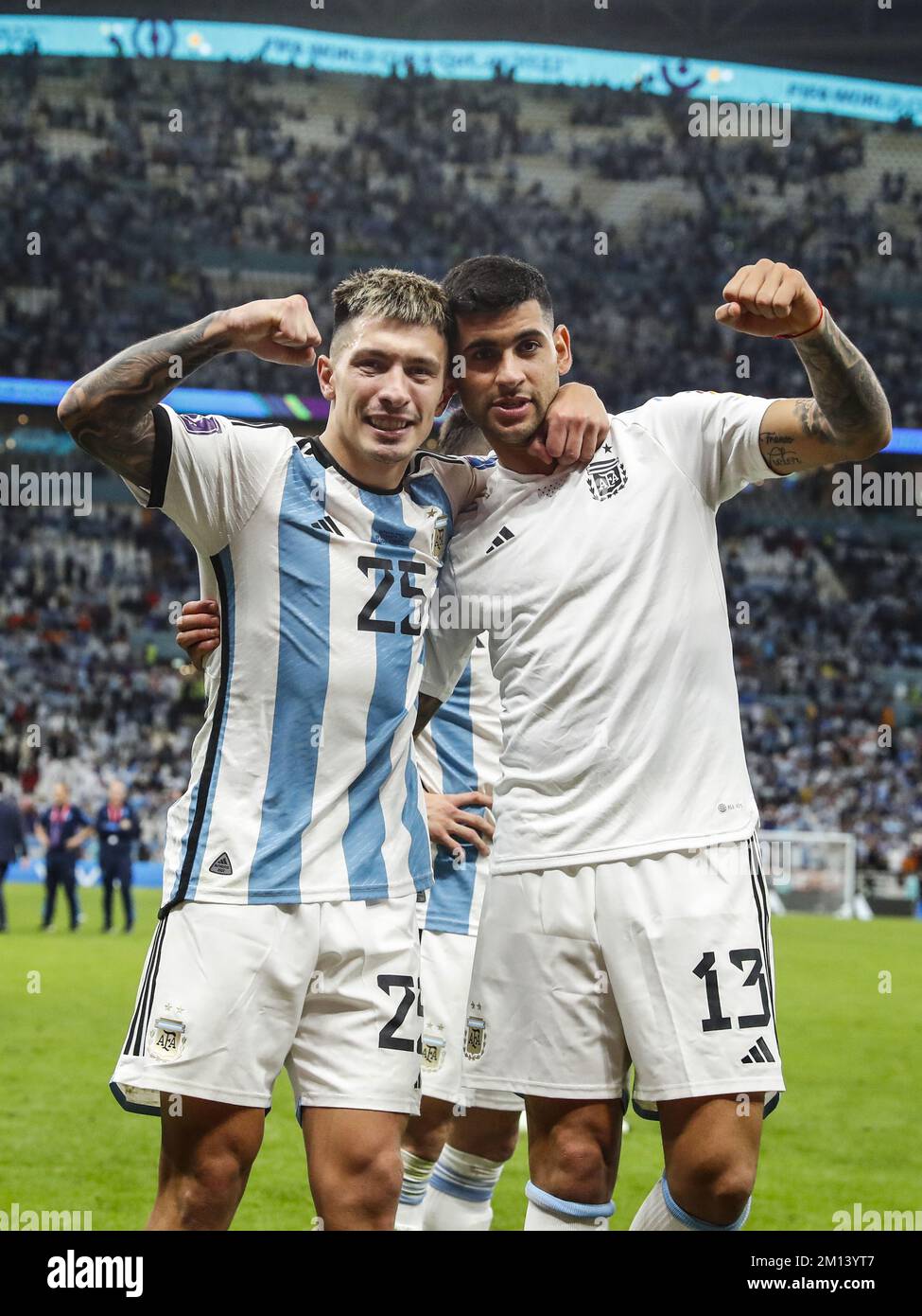 Al Daayen, Qatar. 09th Dec, 2022. AL DAAYEN - Lisandro Martinez of Argentina, Cristian Romero of Argentina celebrate the victory after the FIFA World Cup Qatar 2022 quarterfinal match between the Netherlands and Argentina at the Lusail Stadium on December 9, 2022 in Al Daayen, Qatar. ANP MAURICE VAN STEEN netherlands out - belgium out Credit: ANP/Alamy Live News Stock Photo
