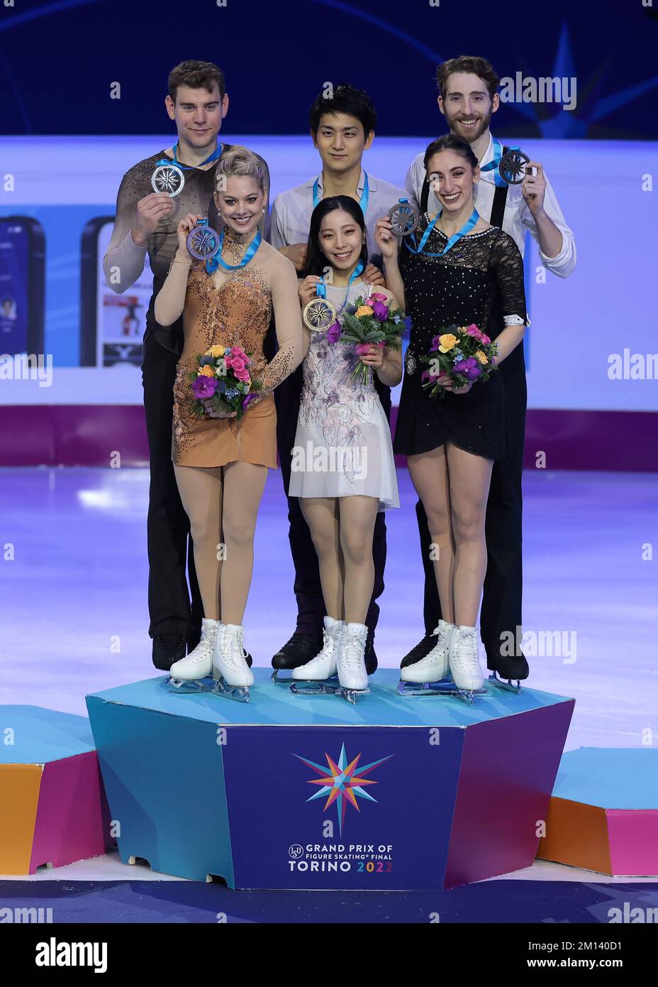Turin, Italy, 9th December 2022. The Senior Pairs Award Ceremony ( L to R ); Silver Medalists Alexa Knierim and Brandon Frazier of USA, Gold Medalists Riku Miura and Ryuchi Kihara of Japan, Bronze Medalists Sara Conti and Niccolo Macci of Italy at Palavela, Turin. Picture date: 9th December 2022. Picture credit should read: Jonathan Moscrop/Sportimage Credit: Sportimage/Alamy Live News Stock Photo