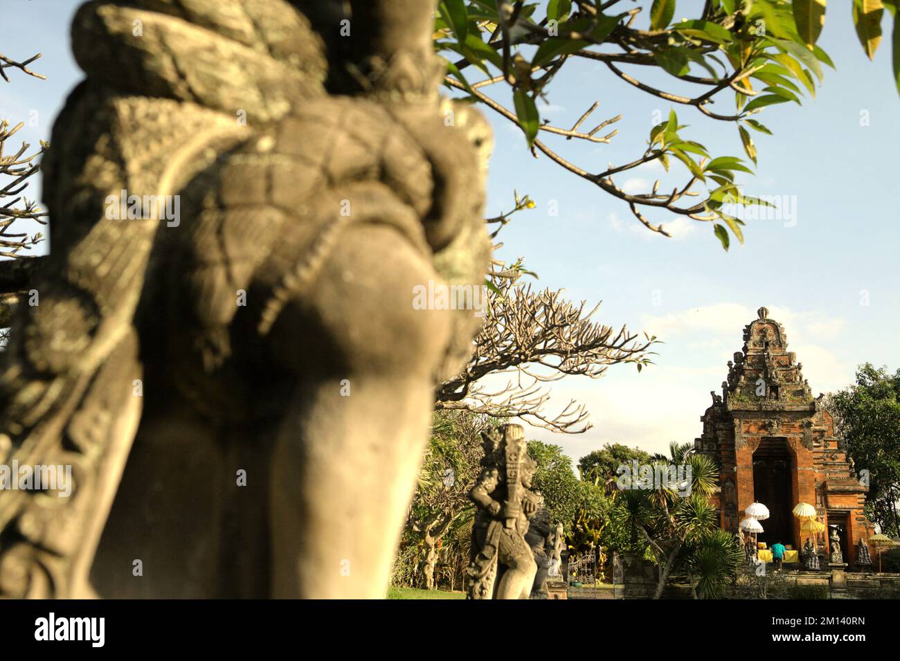 Decorative sculptures and a temple near Kertha Gosa pavilion in Semarapura, Klungkung, Bali, Indonesia. Stock Photo