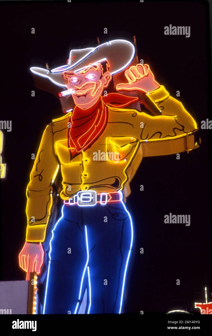 Neon cowboy sign on Fremont Street in downtown Las Vegas, NV. Stock Photo