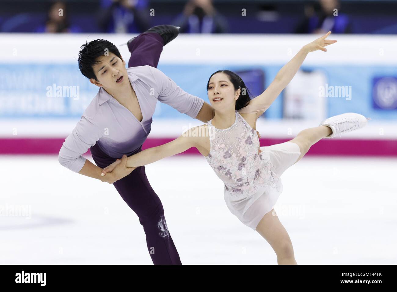 Riku Miura (R) and Ryuichi Kihara of Japan perform in the pairs free