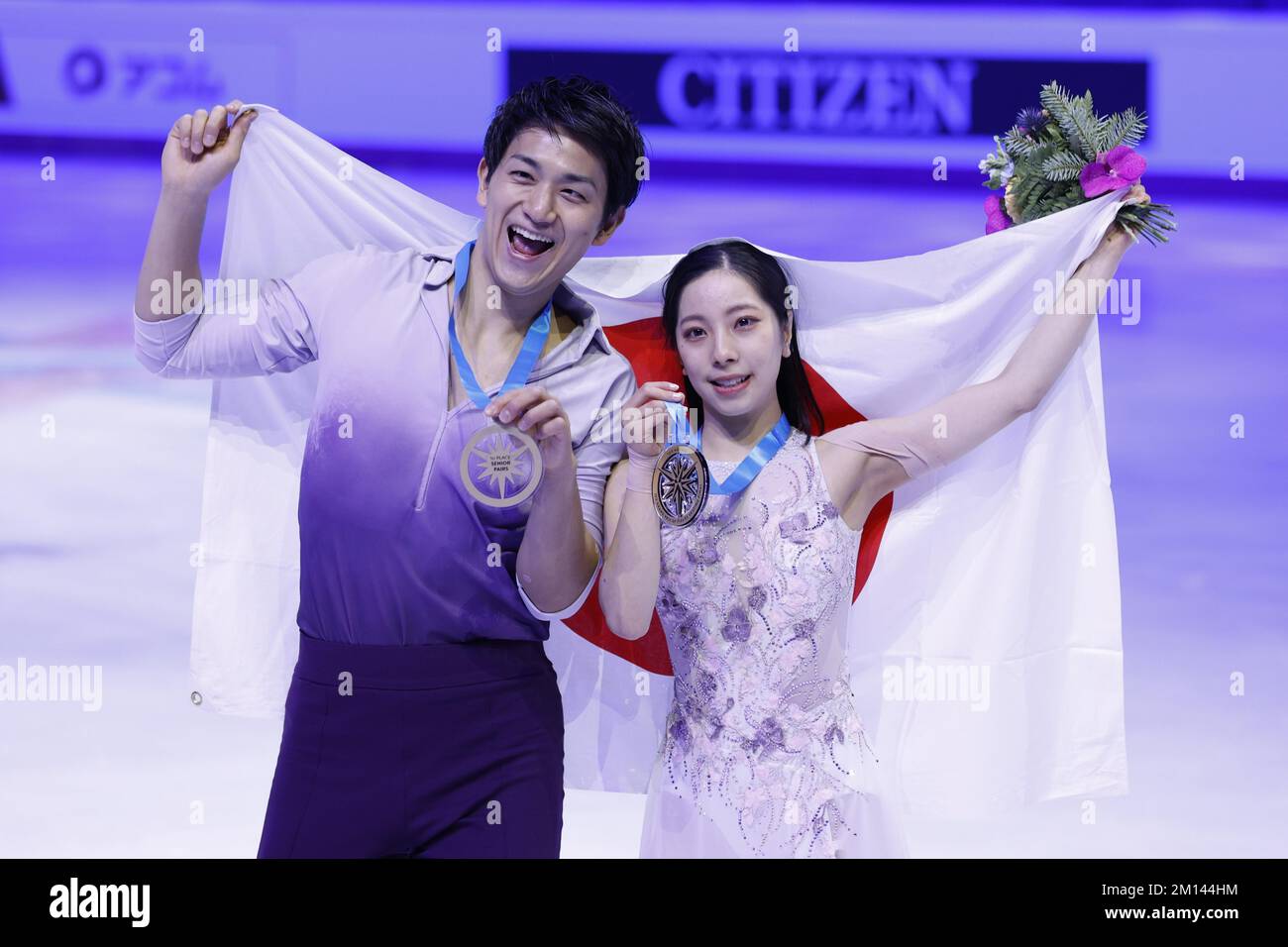 Pairs skaters Riku Miura (R) and Ryuichi Kihara of Japan pose after