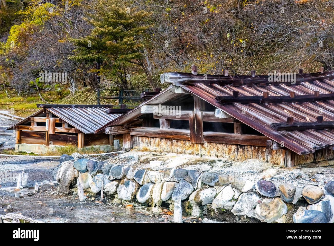 Old wooden onsen bath houses spa buildings in swamp at Nikko Japan. Translation from Japanese: Ohruri sanzo Stock Photo