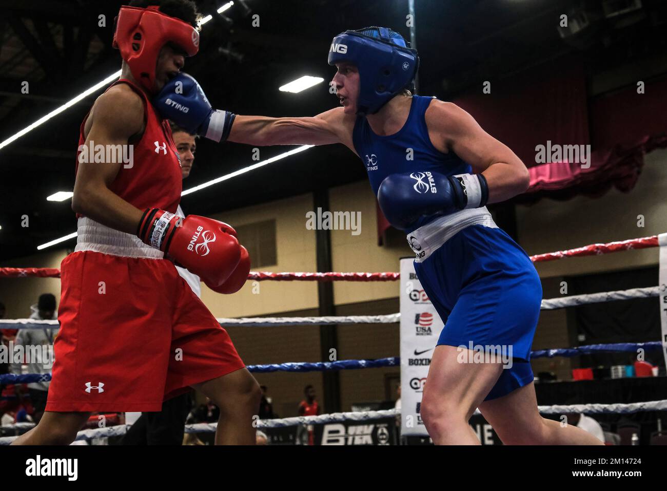 Lubbock, TX, USA. 9th Dec, 2022. Action between Stacia Suttles of Philadelphia, PA (red) and Christine Forkins (blue) of Nashville, TN in an Elite Female 146lb semi final bout. Suttles was declared the winner of the contest by decision and advances to the finals. (Credit Image: © Adam DelGiudice/ZUMA Press Wire) Credit: ZUMA Press, Inc./Alamy Live News Stock Photo