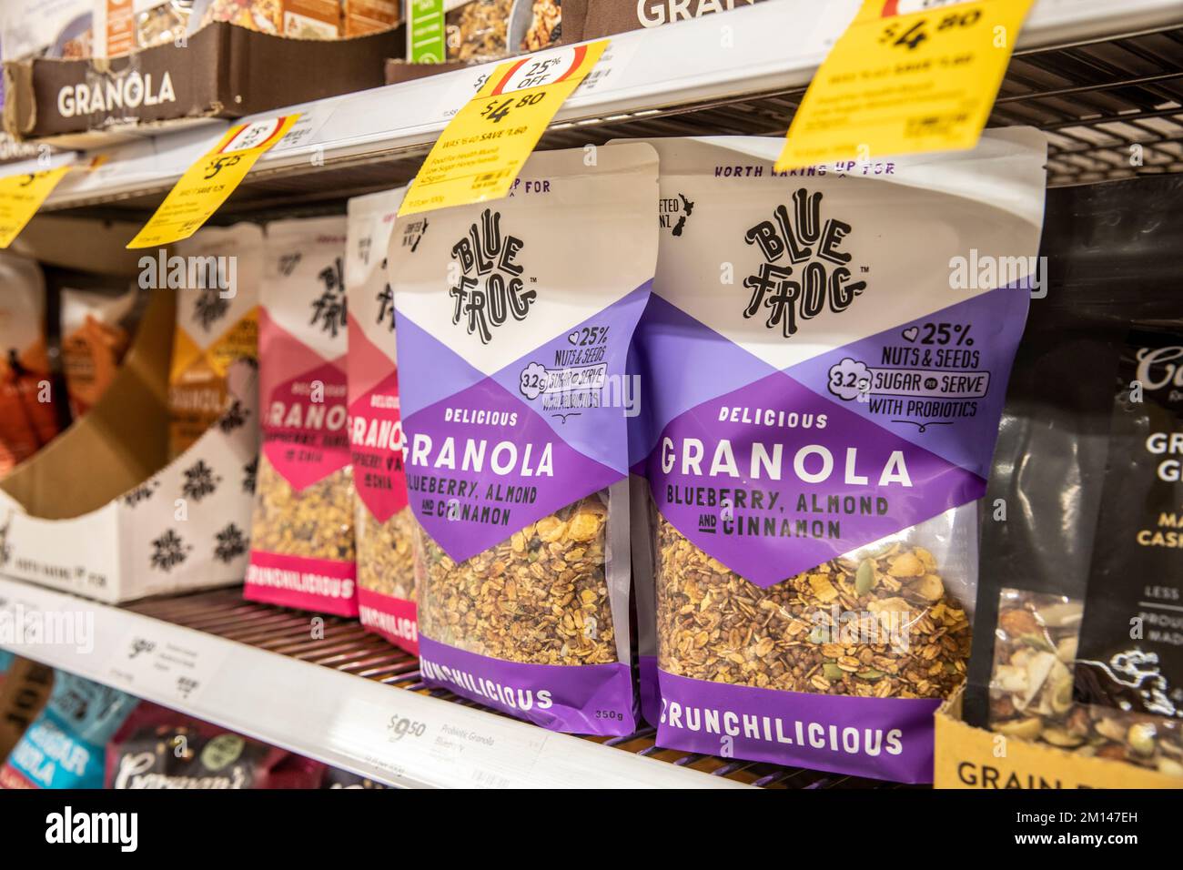 Bags of granola breakfast cereal in raspberry and blueberry flavours