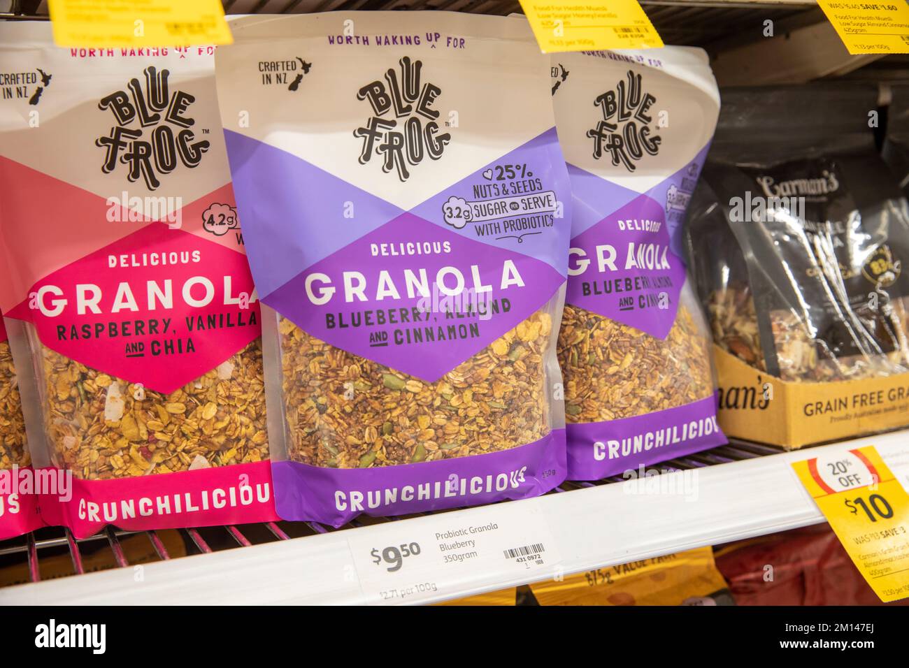 Bags of granola breakfast cereal in raspberry and blueberry flavours