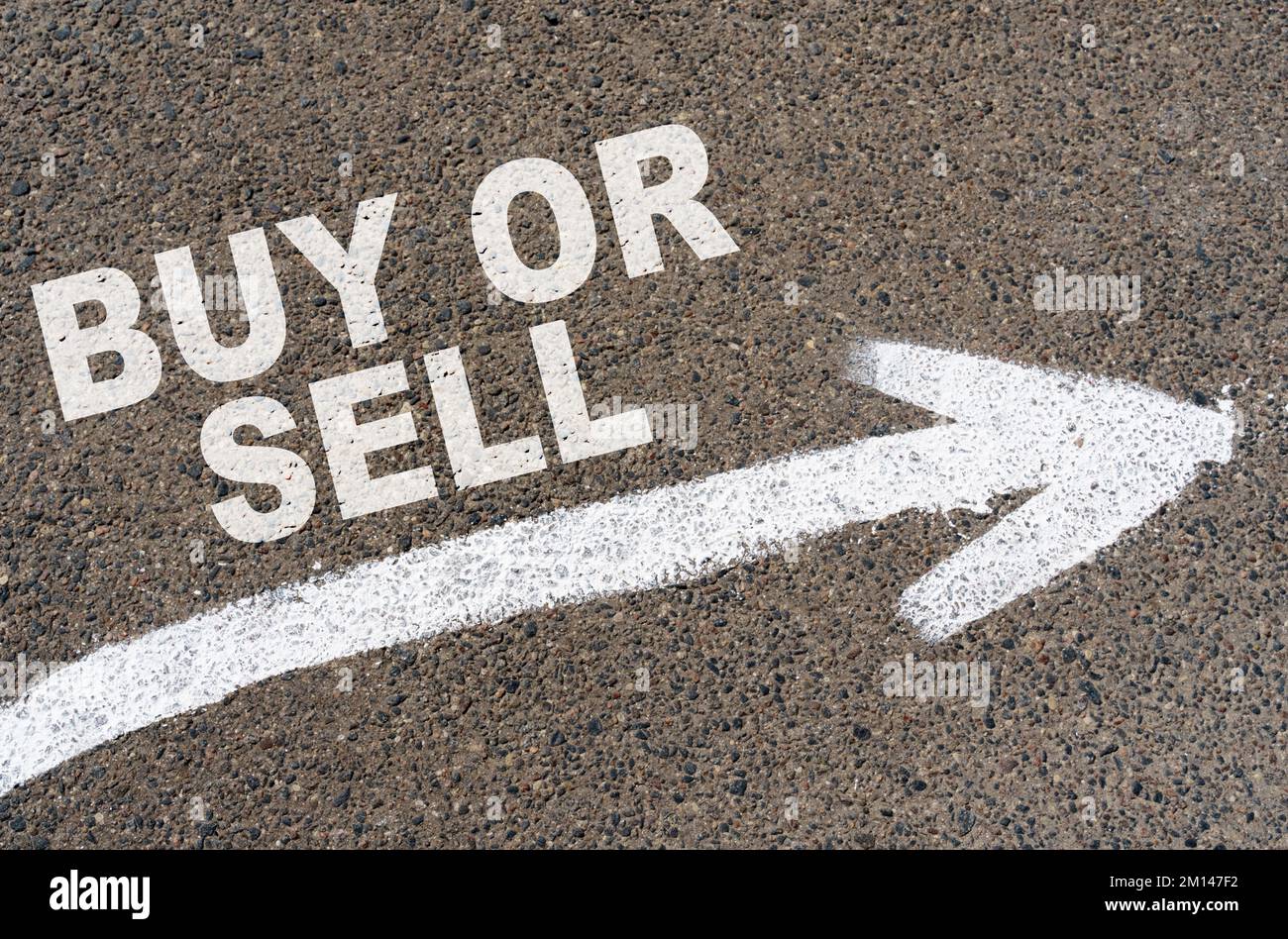 Business concept. On the asphalt road markings an arrow with the