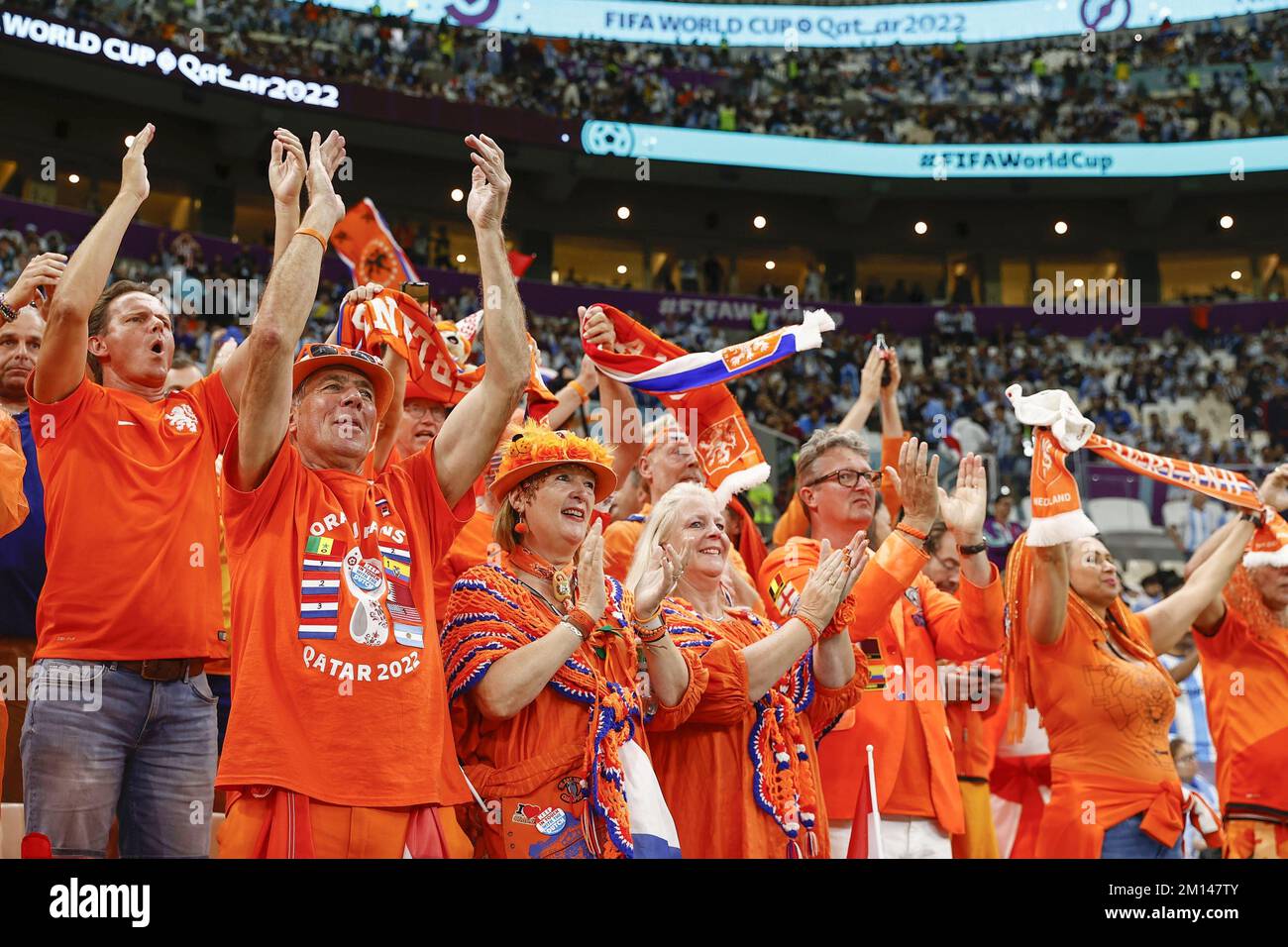 Netherlands supporters cheer ahead of a World Cup quarterfinal football