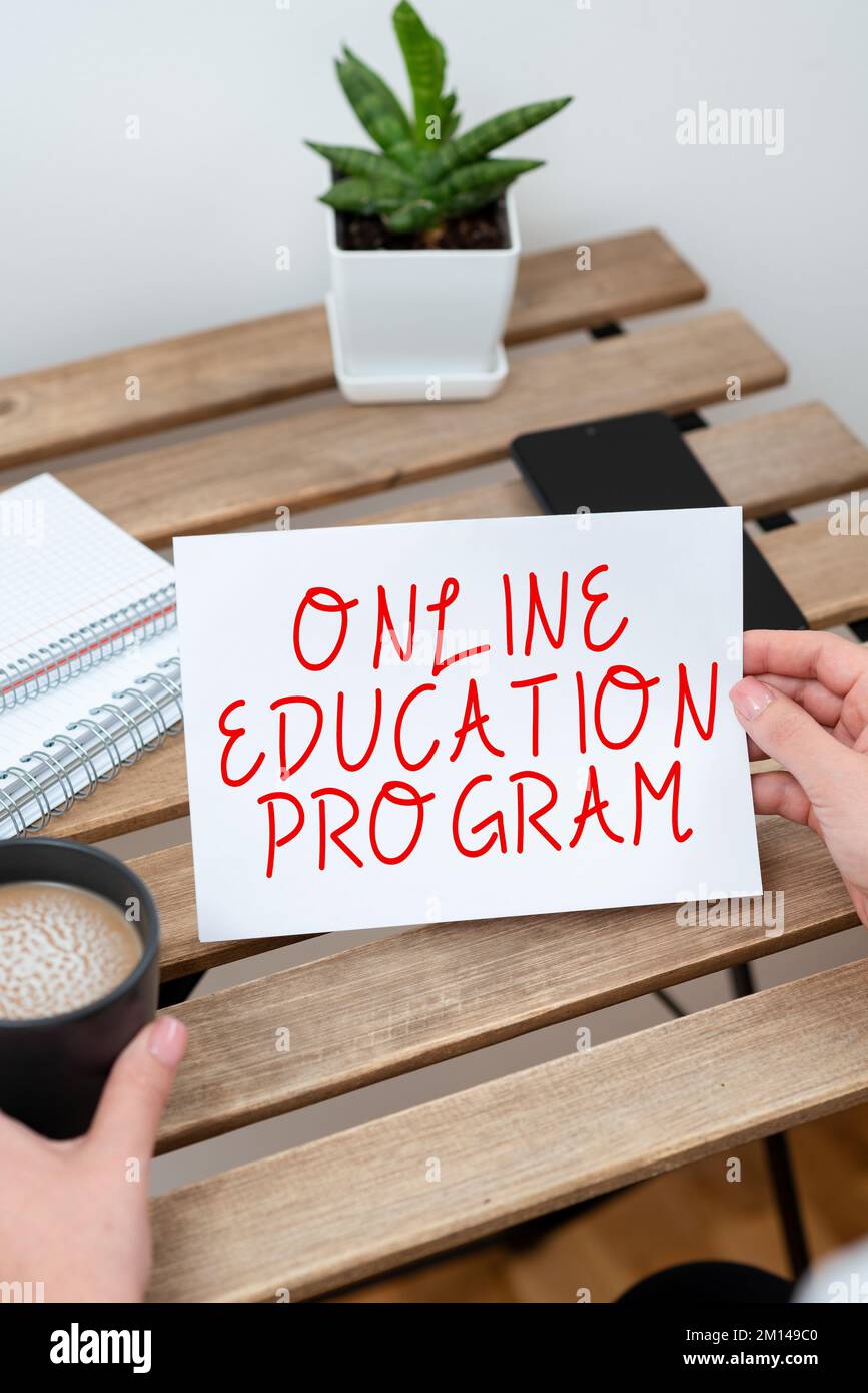 Sign displaying Online Education Program. Conceptual photo Software development and programming courses Stock Photo