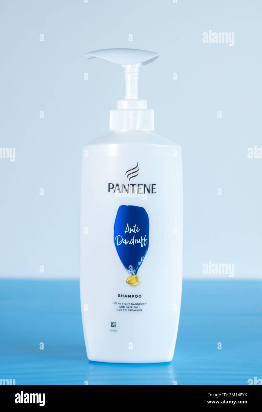 A vertical closeup of Pantene Shampoo (AntiDandruff) bottle isolated