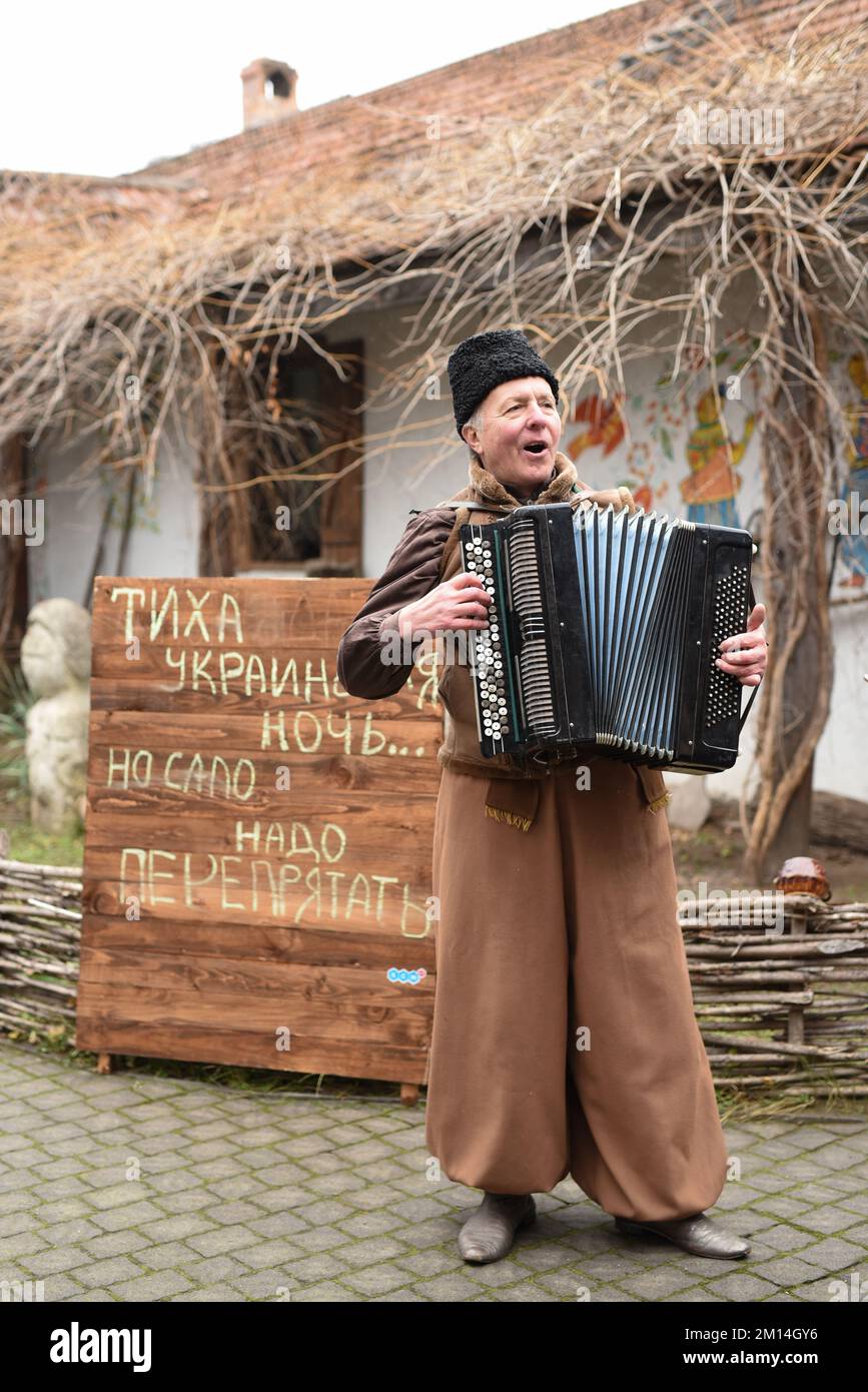 The Ukrainian folk song and dance ensemble in national costumes holds a