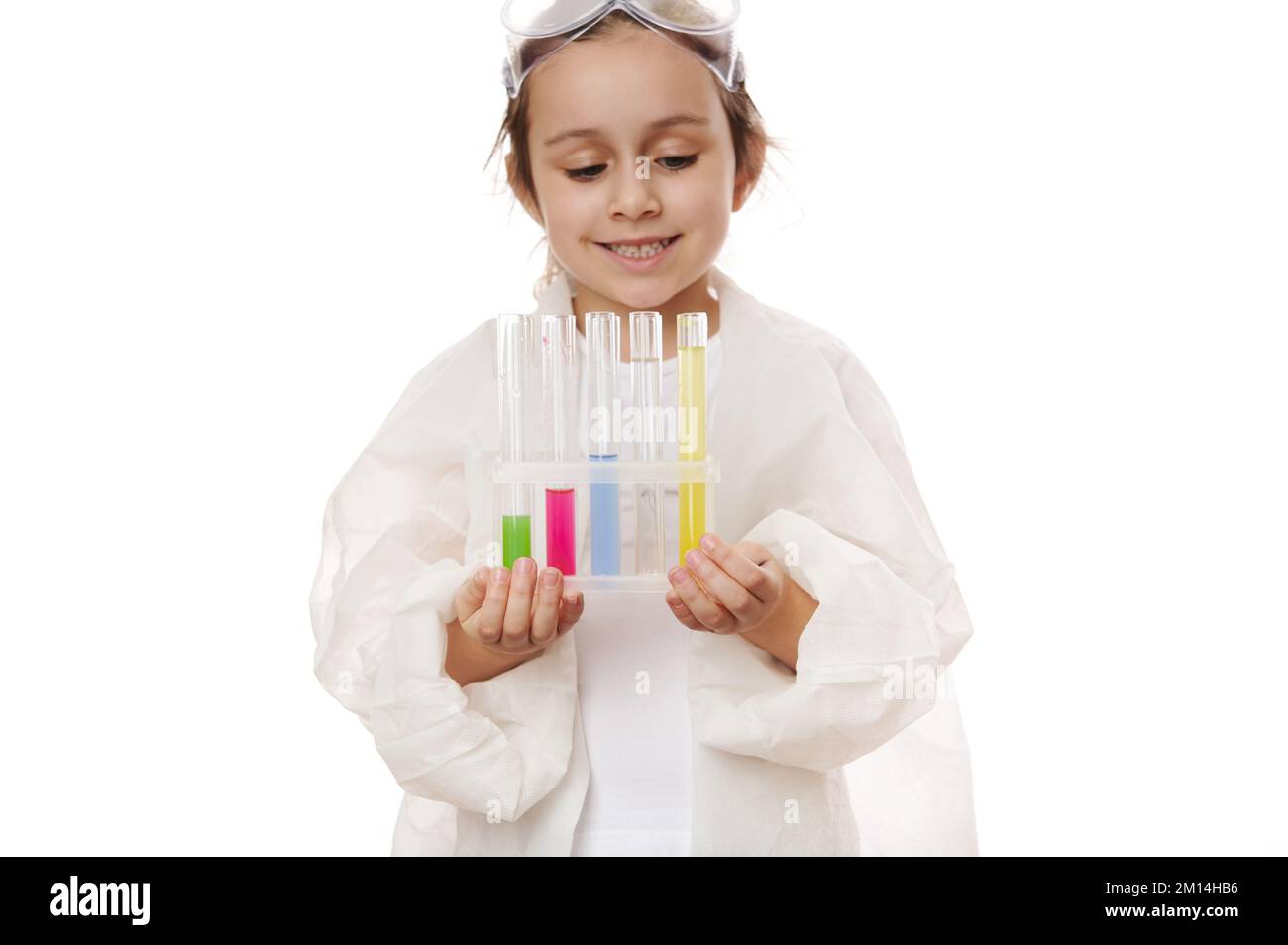 Child Lab Test Laboratory test tubes with colorful reagents and chemicals on tripod in ...