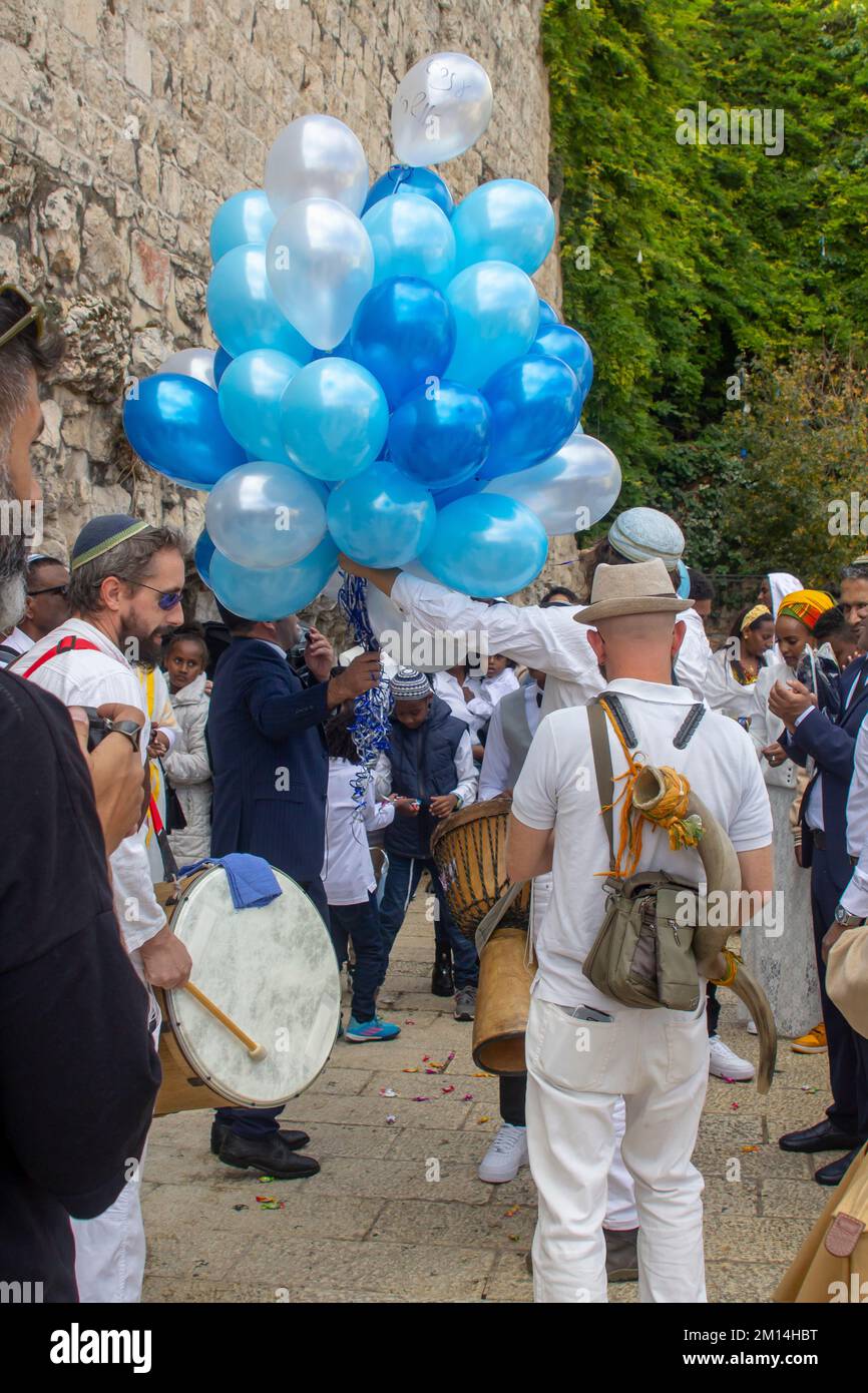 10 Nov 2022 Family and friends enjoying Bar Mitzvah celebrations near the Jaffa Gate as the party makes its way to the Western Wall and the Temple Mou Stock Photo