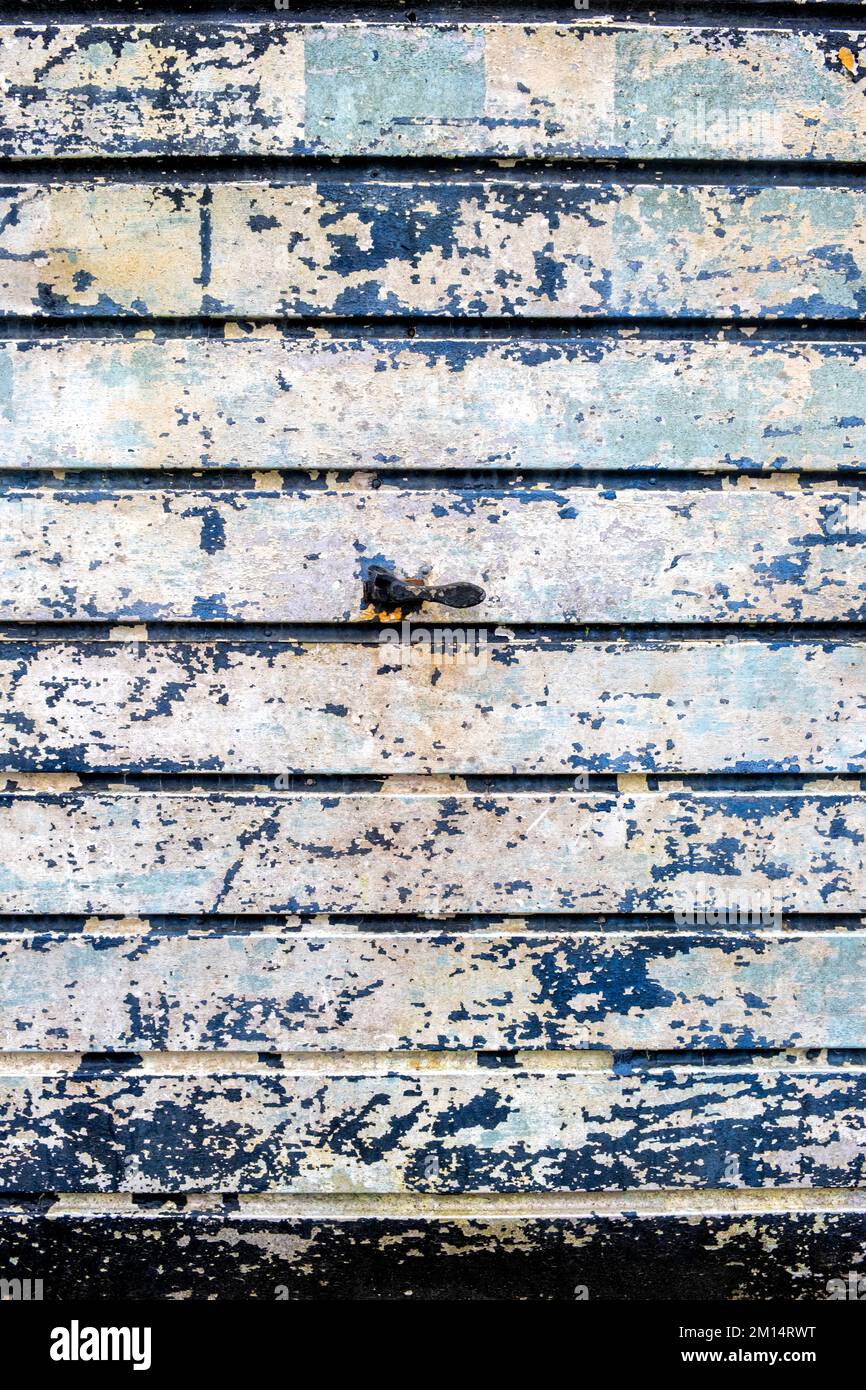 Peeling paint garage door Stock Photo Alamy