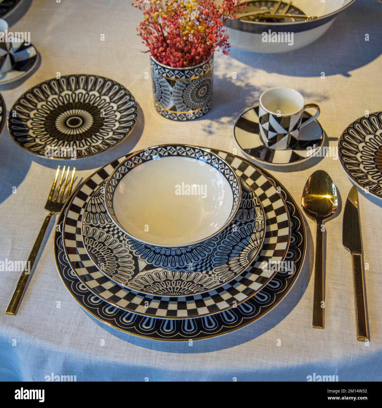 oriental designed luxury dinner plates on the table Stock Photo Alamy