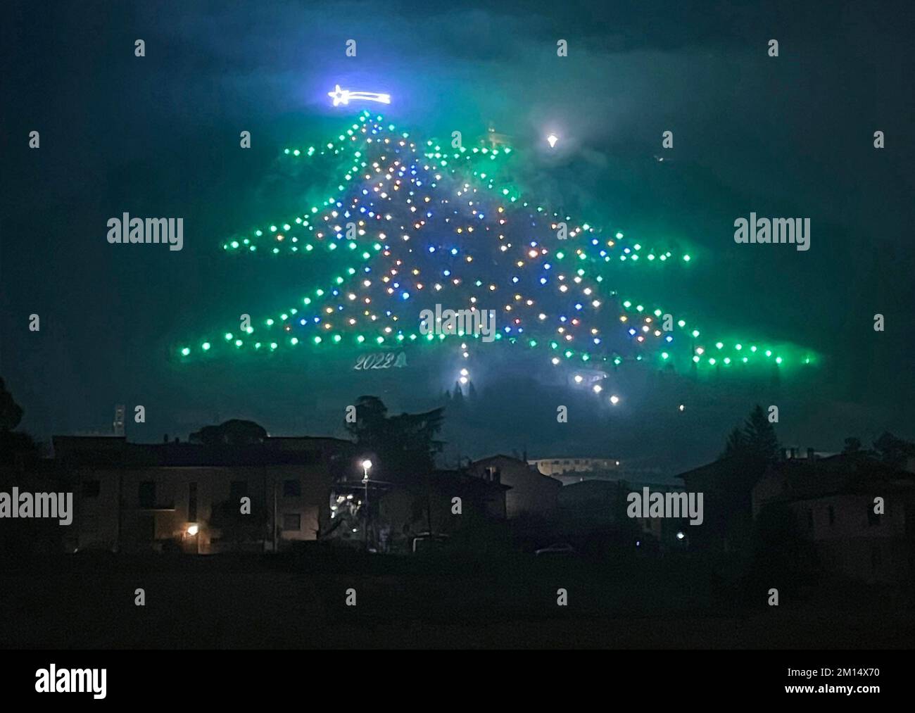 Gubbio, Italy. 09th Dec, 2022. Italy, Gubbio - December 7, 2022 The giant  tree created in one thousand colored lights is recorded in the Guinness  Book of Records since 1991 as being