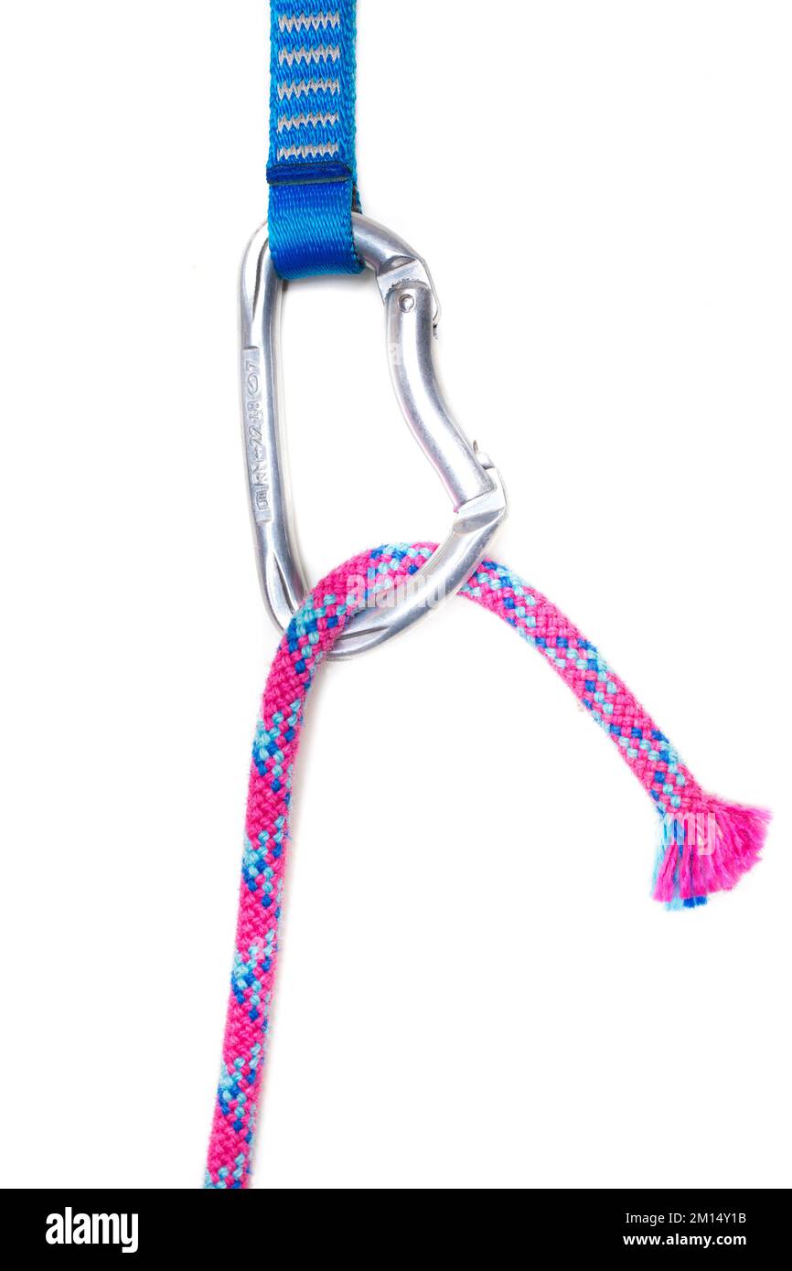 Torn red rope in a carabiner with quickdraw on white background Stock ...