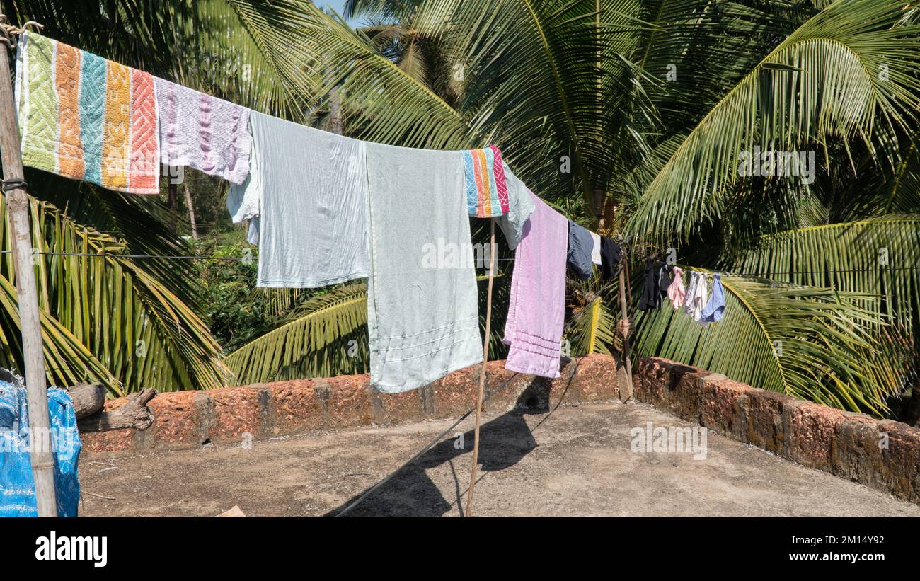 Clothes drying on rope in hi-res stock photography and images - Alamy