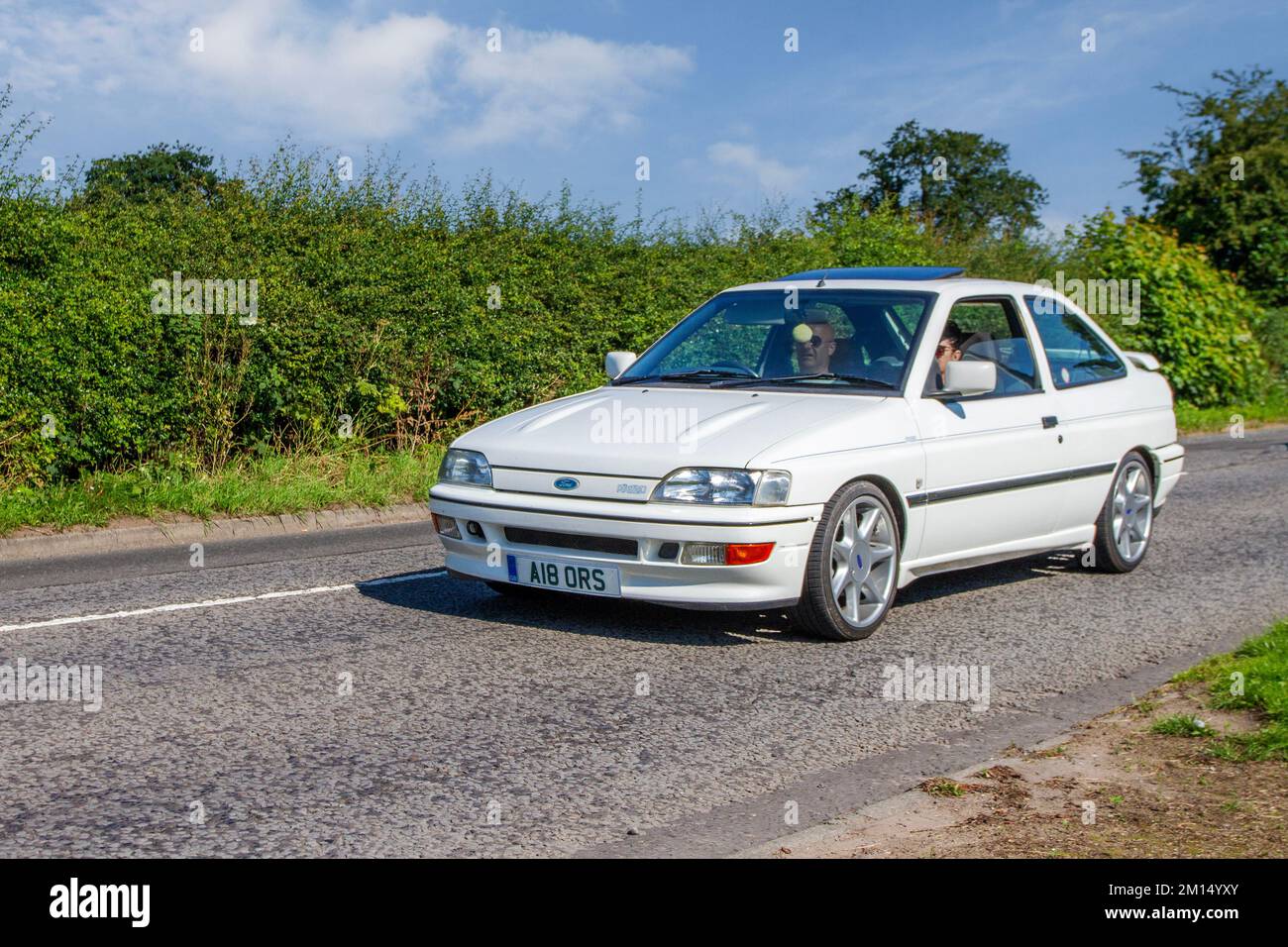 1991 90s nineties White Ford Focus RS 2000; en-route to Capesthorne Hall classic May car show, Cheshire, UK Stock Photo