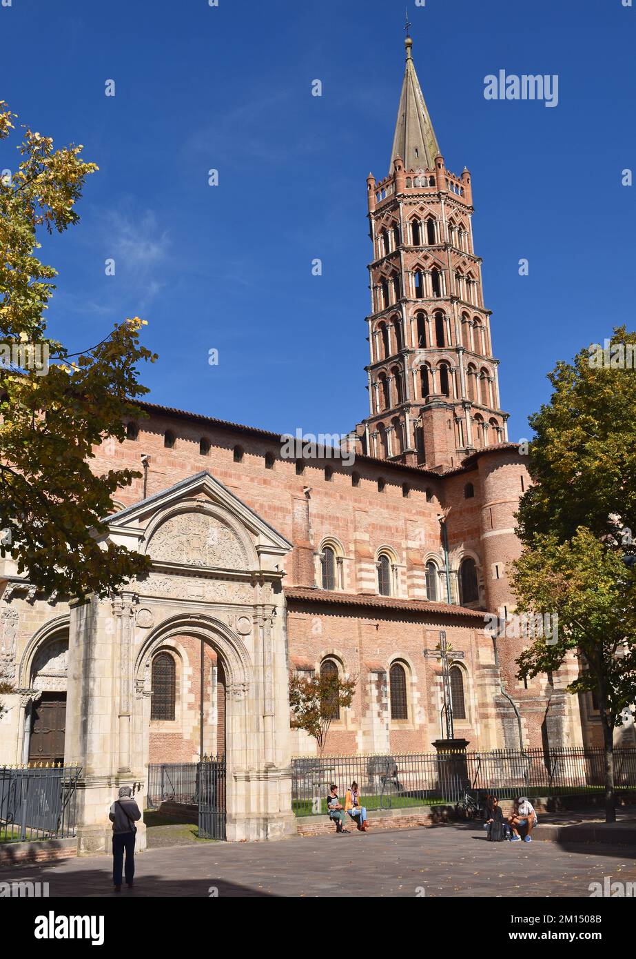 The Basilica church of St Sernin, Toulouse, largest Romanesque building in Europe, of red brick, la ville rose, built c1180-1220 & Renaissance Gate Stock Photo