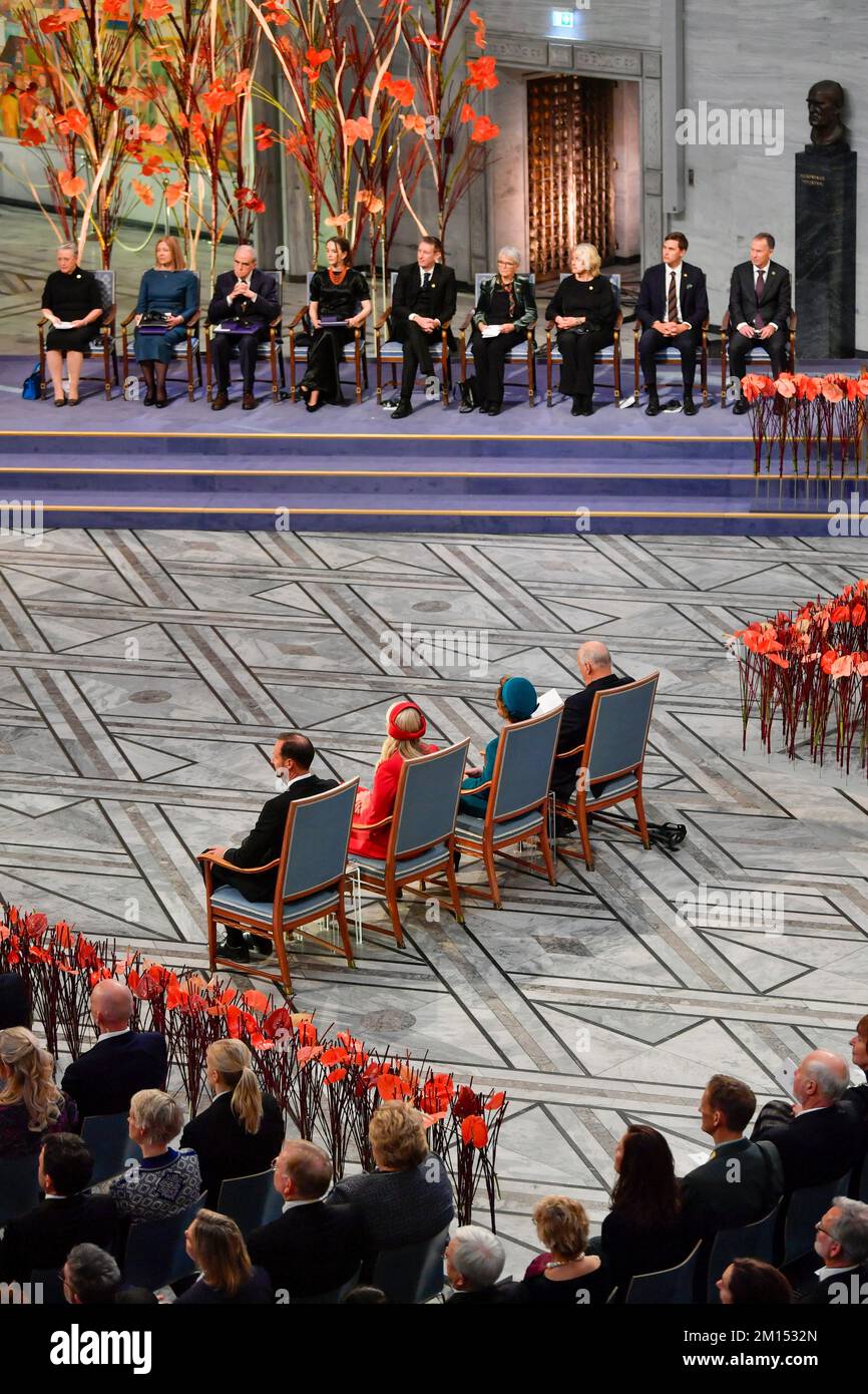 Oslo 20221210.From left on the podium: Berit Reiss-Andersen chair of the Norwegian Nobel Committee, laureates Natallia Pintsyuk, representing her husband the activist Ales Byalyatski from Belarus, Jan Ratchinskij, representing the Russian organization Memorial and Oleksandra Matviytsyuk, representing the Ukrainian organization Center for Civil Liberties ( CCL), the Nobel Committee's deputy chairman Asle Toje, committee members Anne Enger, Kristin Clemet and Joergen Watne Frydnes and committee secretary Olav Njoelstad, during the awarding of the Nobel Peace Prize for 2022 in Oslo City Hall on S Stock Photo