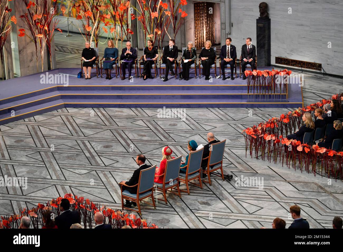 Oslo 20221210.From left on the podium: Berit Reiss-Andersen chair of the Norwegian Nobel Committee, laureates Natallia Pintsyuk, representing her husband the activist Ales Byalyatski from Belarus, Jan Ratchinskij, representing the Russian organization Memorial and Oleksandra Matviytsyuk, representing the Ukrainian organization Center for Civil Liberties ( CCL), the Nobel Committee's deputy chairman Asle Toje, committee members Anne Enger, Kristin Clemet and Joergen Watne Frydnes and committee secretary Olav Njoelstad, during the awarding of the Nobel Peace Prize for 2022 in Oslo City Hall on S Stock Photo