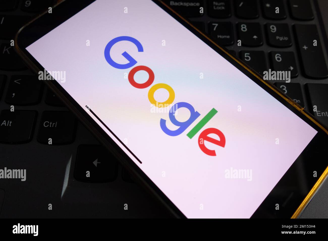 KONSKIE, POLAND - September 17, 2022: Google Search logo displayed on smartphone screen in the office. Google Search is the most popular web search en Stock Photo