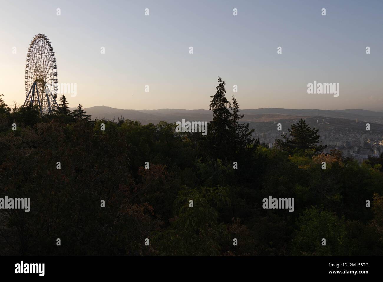 Veiw to the ferris wheel in the Mtatsminda park, Tbilisi, Georgia Stock Photo